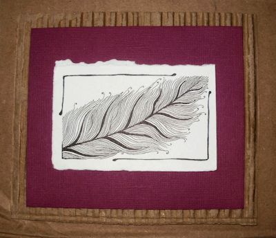 Feather pen and ink drawing on a corrugated background - a self hanging frame recycled from post consumer packaging